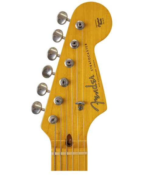 Detailed view of the headstock from a 2012 Warmoth Strat Partscaster, highlighting its unique features and quality.
