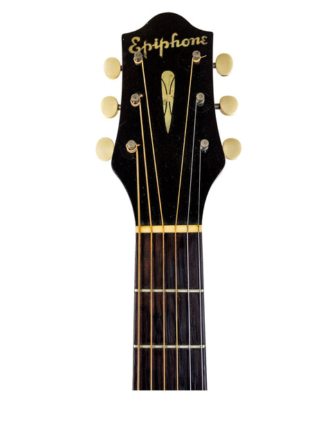 Detailed view of the headstock on a 1935 Epiphone Masterbilt Zenith acoustic guitar, inscribed with "sophia."
