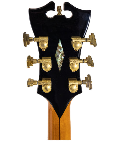 Detailed view of the headstock on a 2008 D’Angelico New Yorker Series Excel EXL-1DP electric guitar, showcasing its design.