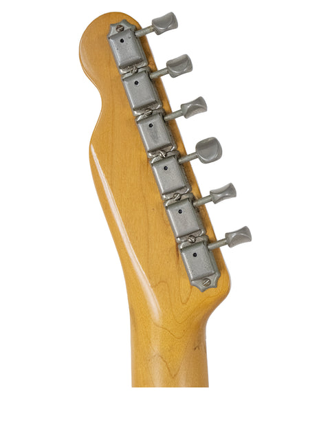 Detailed view of the neck of a 1984 Fender Squier JV Telecaster, highlighting its classic features and craftsmanship.
