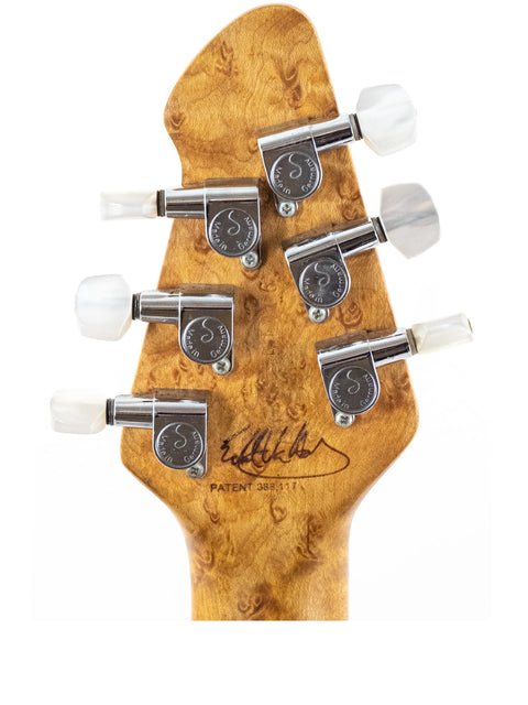 Detailed view of the neck of a 1999 Peavey EVH Wolfgang Standard Hardtail guitar, highlighting its smooth finish and frets.