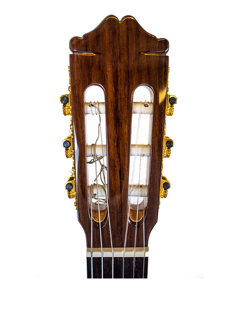 Detailed view of the neck of an Alhambra C-Series ORO Classical Guitar, highlighting its fine woodwork and Spanish heritage from 2005.