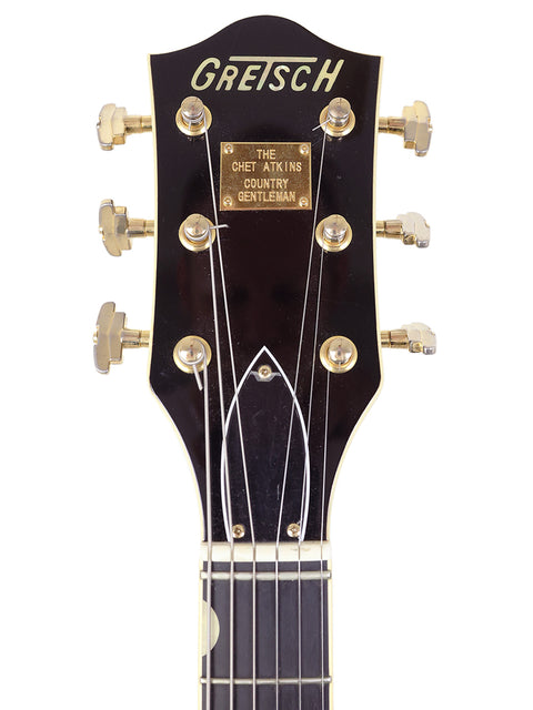 Electric guitar headstock featuring the Gretsch logo, from the 2015 Chet Atkins Country Gentleman model, perfect for collectors.
