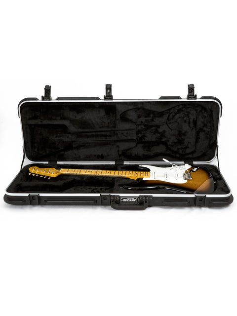 Electric guitar in a hard case against a white background.