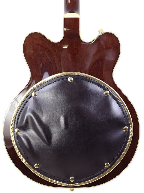 Elegant Gretsch 6122T guitar with a sleek black leather cover and stunning gold hardware, perfect for musicians and collectors.