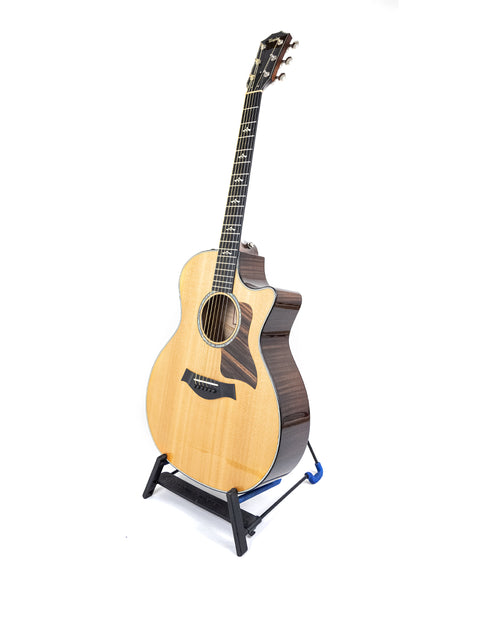 Elegant Taylor 614ce grand acoustic guitar, crafted in the USA in 2016, perfect for musicians and collectors alike.