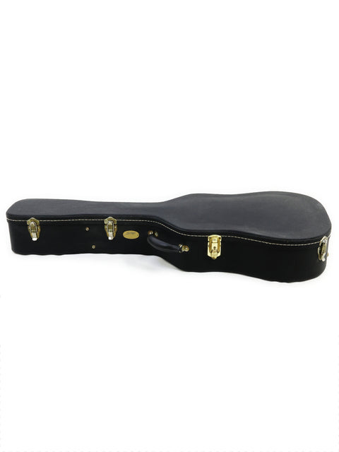 Elegant black guitar case adorned with gold hardware, showcasing the Collings D2H from the USA, made in 2006.