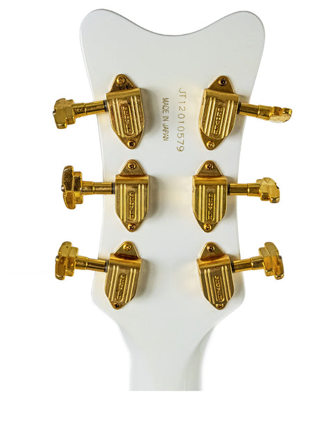 Elegant white Gretsch G7593 White Falcon guitar featuring gold hardware and a striking gold headstock, from Japan 2012.
