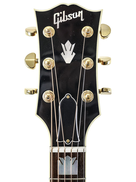 Elevate your music with this black Gibson Les Paul Custom Shop, a must-have for serious guitarists and collectors alike.
