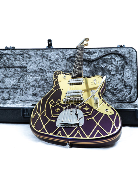 Eye-catching purple guitar adorned with gold and black patterns, the Zachary & Mercer Mastermind “Royal” Offset, Aust 2021.