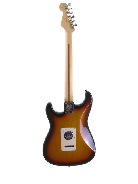 Fender 60th Anniversary American Stratocaster featuring a brown body and stylish black pickguard, from 2006.
