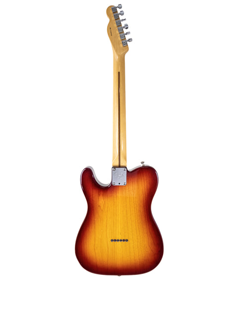 Fender American Standard Telecaster electric guitar from 2002, featuring Duncan pickups, showcasing classic design and craftsmanship.

