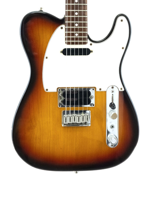 Fender American Standard Telecaster in sunburst, model Telecaster Plus v.1 from 1991, highlighting its iconic shape and color.
