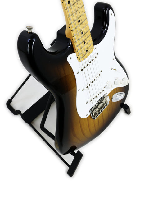Fender Custom Shop 50th Anniversary '54 Stratocaster, featuring a black body and white pickguard, crafted in the USA, 2004.