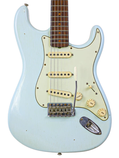 Fender Custom Shop '59 Stratocaster with a white body and blue neck, showcasing its unique design and craftsmanship.