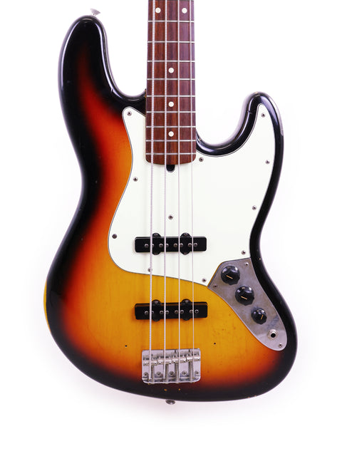 Fender Jazz Bass guitar with a sunburst finish, showcasing the 2006 Custom Shop '64 Relic design.