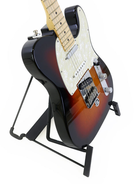 Fender Nashville B-Bender Telecaster guitar elegantly positioned on a stand with a contrasting black backdrop.