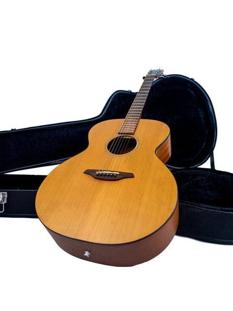 Furch S40-CM guitar from 2008 lies in its case, set against a stark white backdrop.