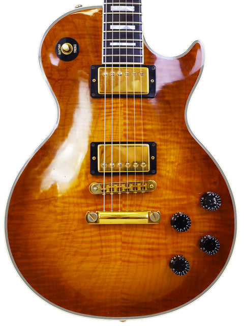 Gibson Les Paul Custom electric guitar with a sunburst finish, showcasing its classic design and craftsmanship from 1994.