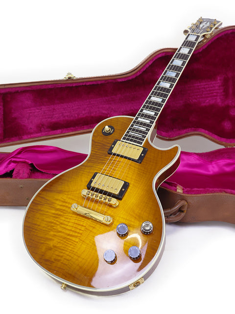 Gibson Les Paul Custom guitar from 1994, securely placed in its protective case, showcasing its elegant design.
