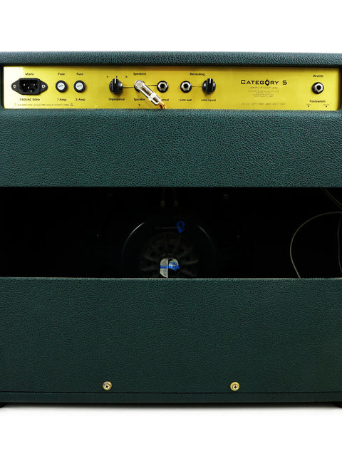 Green guitar amplifier from 2012, the Category 5 Ivan Combo, showcasing a distinctive yellow knob for adjustments.