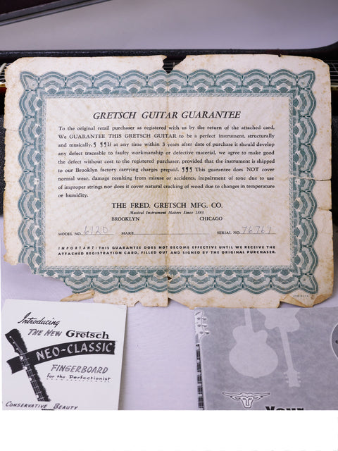 Gretsch 6120 Chet Atkins guitar with case and authenticity certificate—essential for any guitar lover's collection.