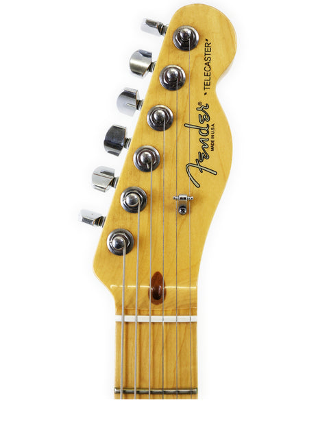 Headstock of a Fender Telecaster guitar with tuning pegs and logo on a white background.
