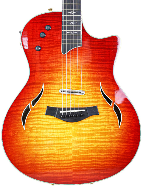 Image of a Taylor 812ce guitar, model T5-C1, made in the USA in 2010, showcasing its elegant design and craftsmanship.