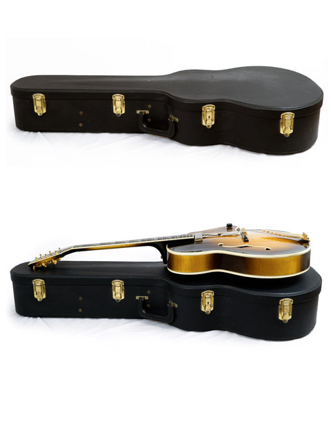 Image of two guitars in cases, including a 1997 Gibson Custom Shop Le Grand Archtop from the USA.