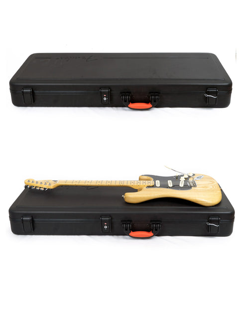 Inside a black case, two guitars are displayed, one being a 2015 Fender Limited Edition Stratocaster.
