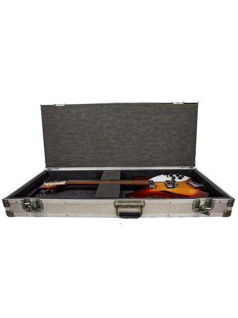 Inside a guitar case, a 1994 Rickenbacker 330 in Fireglo finish rests securely.