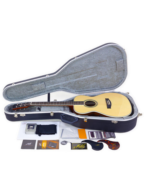Inside a guitar case, a Maton Custom Shop Classic guitar rests with accessories and other items, representing Australian artistry.