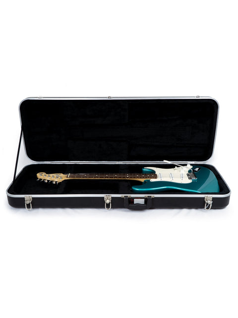 Inside a guitar case lies a green Fender 40th Anniversary American Standard Stratocaster from 1994.