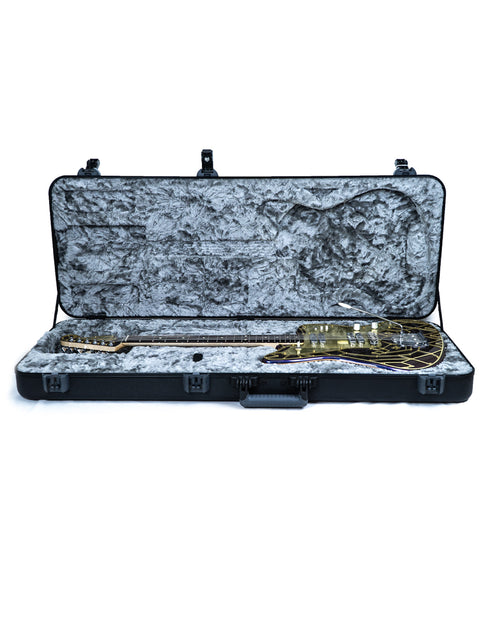 Inside a stylish guitar case lies a beautiful gold Zachary & Mercer Mastermind “Royal” Offset guitar, crafted in 2021.
