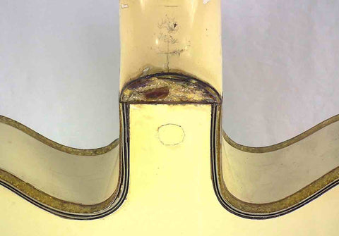 Intricate close-up of the headstock of a 1968 Gretsch 6136 White Falcon, emphasizing its classic style and rich history.