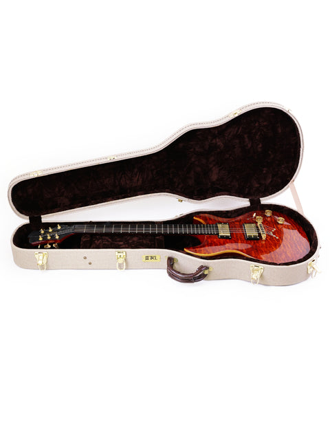 Jarrett Forza guitar case in red with a black headstock, Serial #00001, made in the USA, 2007.
