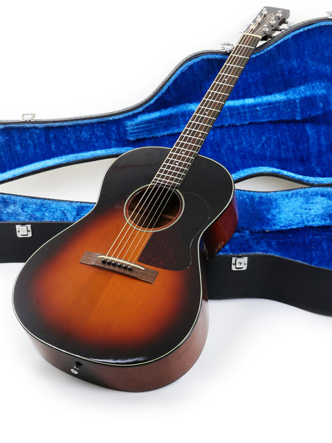 K. Yairi G-1F guitar with its case displayed against a white background, highlighting its craftsmanship from Japan, 2005.