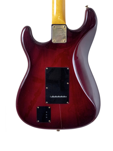 Levinson Blade R2 Strat Style guitar from Japan, 1989, featuring a red finish, yellow body, and black pickguard.
