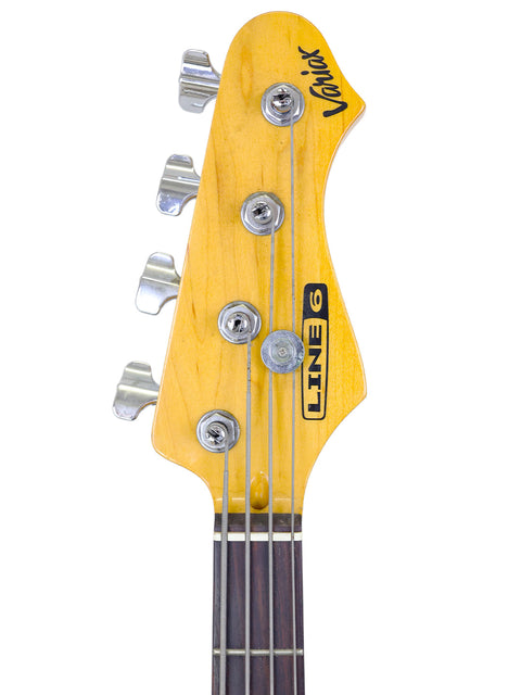 Line 6 Variax Bass guitar featuring a vibrant yellow body and sleek black headstock, made in Korea in 2004.