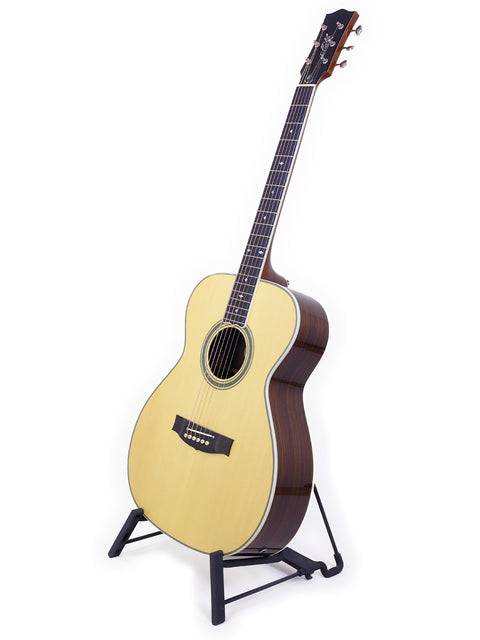 Maton Custom Shop Classic guitar displayed on a stand with a white backdrop. Origin: Australia, 2020.
