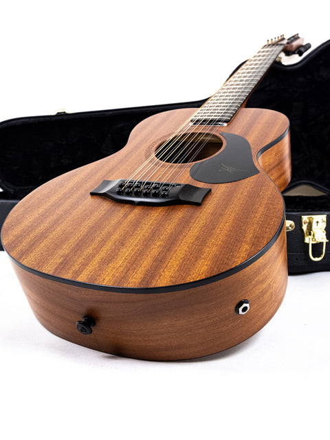 Maton Mahogany Mini12 String guitar resting in its case, set against a clean white background, showcasing its elegant design.
