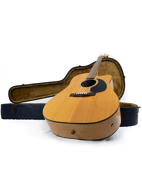Maton Stage Delux Rock Maple guitar from 1992 rests in its case against a clean white background.
