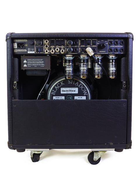Mesa Boogie Mark IV Combo Amplifier in black, showcasing a clock on its top, made in the USA in 2003.
