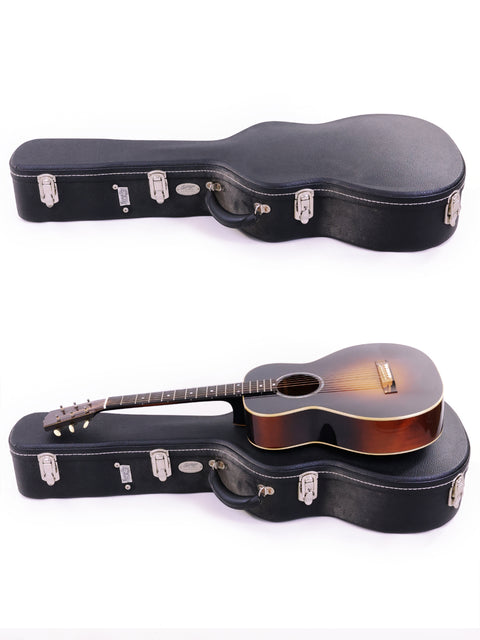 On a white background, two guitars are displayed in a case, representing the Beau Hannam Parlour crafted in Australia, 2009.