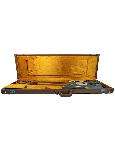 Open guitar case with a white electric guitar inside.