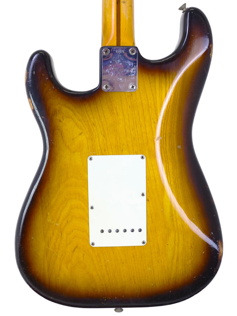 Original 1954 Fender Custom Shop Stratocaster in a stunning sunburst finish, highlighting its vintage appeal.