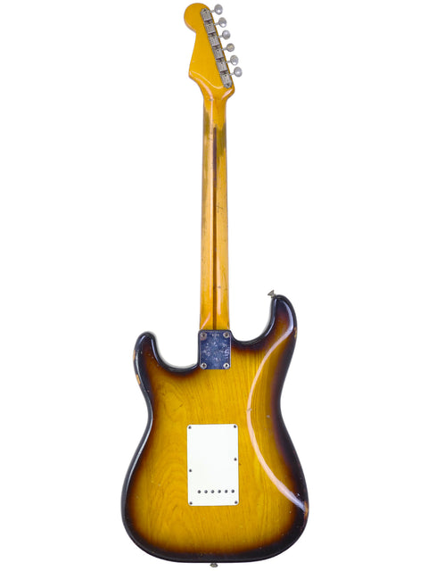 Original 1954 Fender Custom Shop Stratocaster with a stunning sunburst finish, highlighting its vintage appeal.