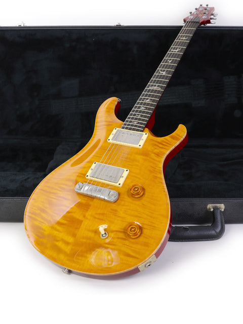 PRS Custom 24 electric guitar, featuring a stunning finish and expert craftsmanship, USA-made, 2005 model.