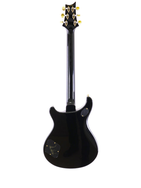 PRS McCarty 594 electric guitar in black with a striking gold headstock, made in the USA, 2016 edition.