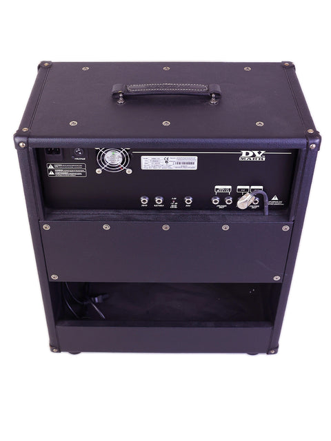 Rear of a black guitar amplifier showing control inputs, cooling fan, and power options.